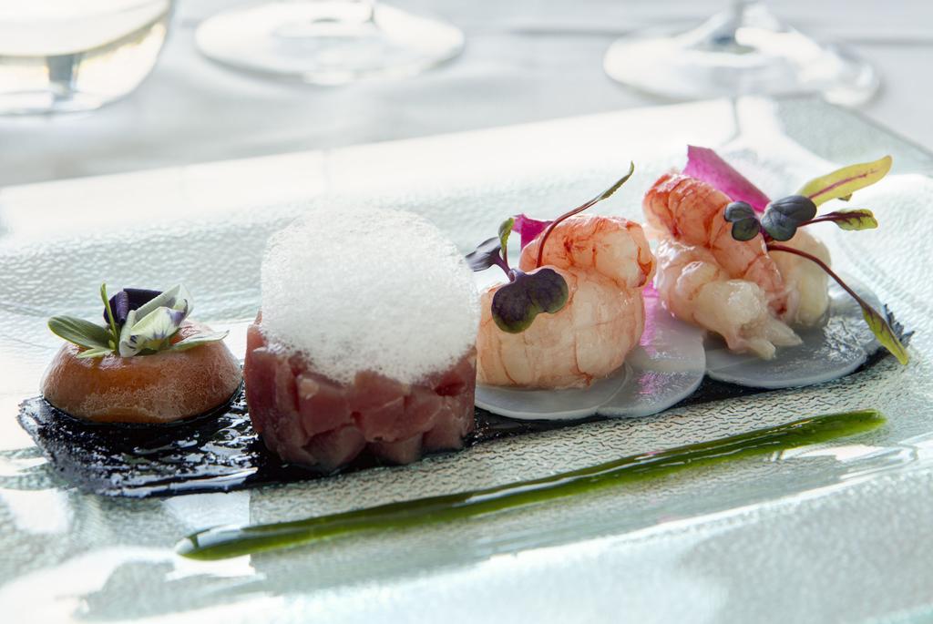 Almar Jesolo Resort & Spa Exterior photo A modern French dish