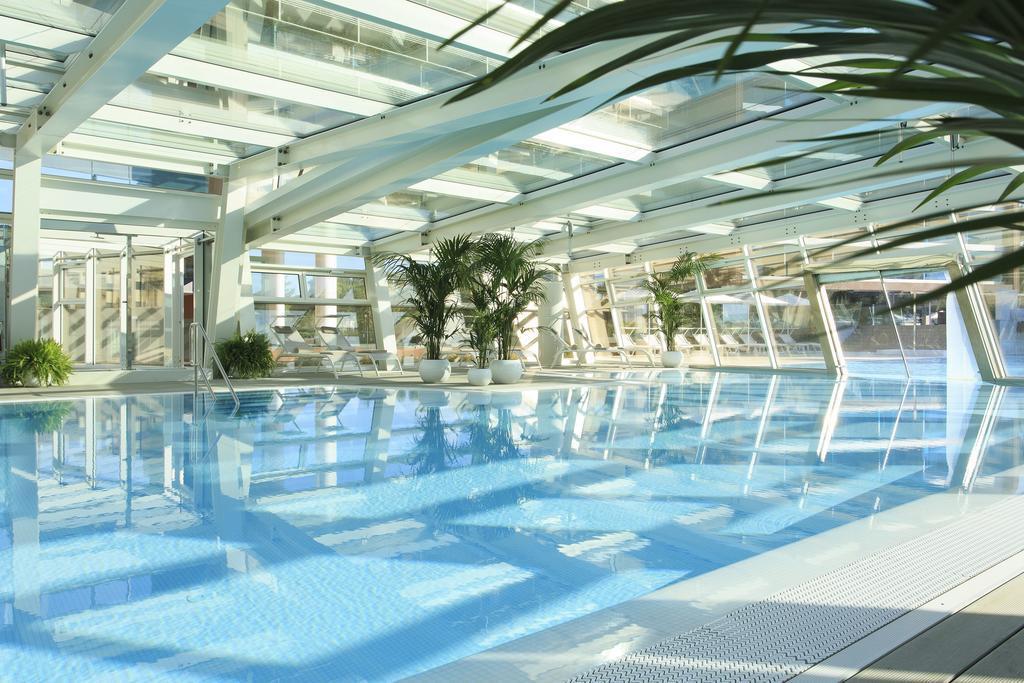 Almar Jesolo Resort & Spa Exterior photo The swimming pool at the hotel